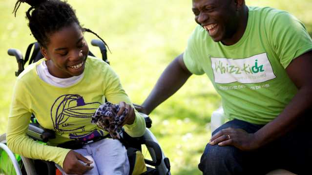 Dad and daughter in outdoor play area at WhizzKidz in London