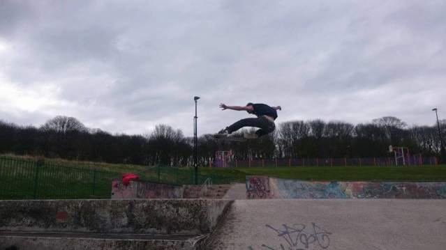 Boy skate boarding at Phoenix Park Runcorn