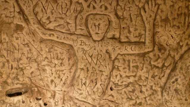 Carving on wall at Royston Cave