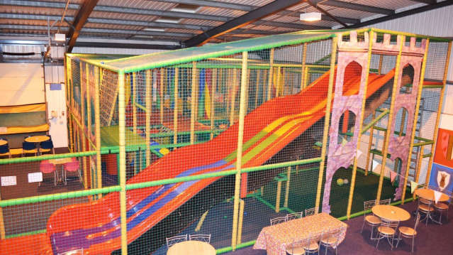 Indoor soft play frame and slide at Kingdom Come in Abergavenny