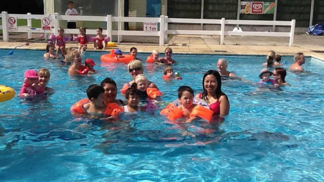 Families in outdoor swimming pool at Severn Centre in Bridgnorth