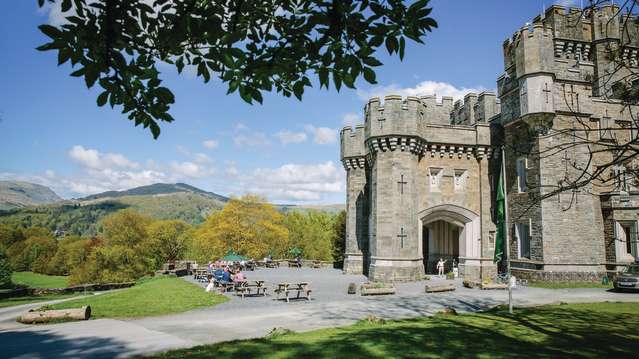 Outdoor picnic tables at Wray Castle in Ambleside