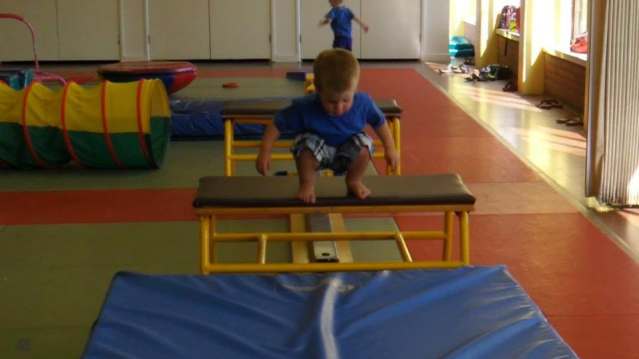 Boy jumps on inflatable at North Devon Leisure Centre in Barnstaple