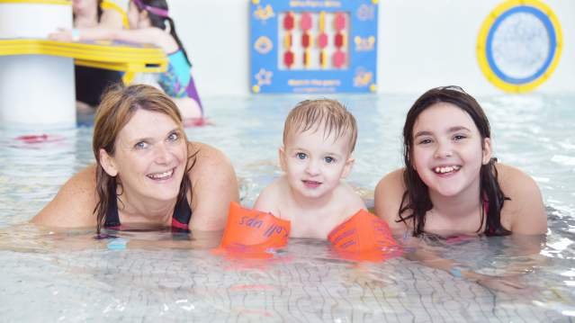 Family swimming at Dunes Splash World in Southport