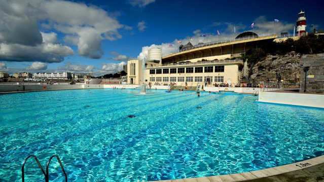 People swimming at Tinside Lido in Plymouth