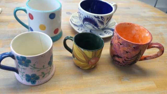 Painted cups at Ceramics Cafe Farnham