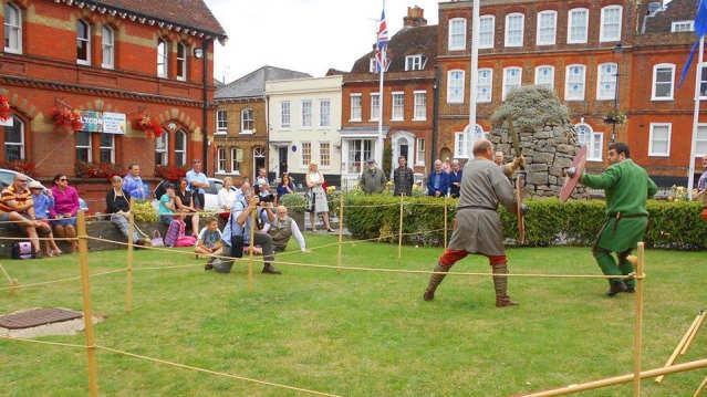 Men sword fighting at Curtis Museum in Alton