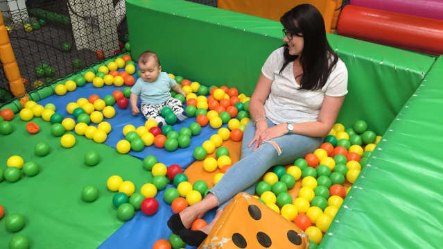 Mum and baby in ball pit at Adventureland in Walsall