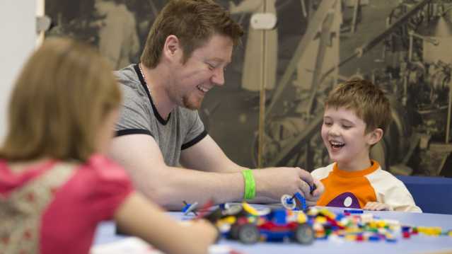 A family playing at British Motor Museum, Gaydon