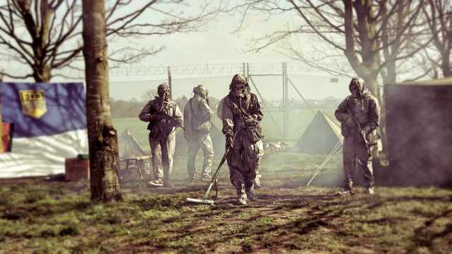 People paintballing at Hack Green Secret Nuclear Bunker in Nantwich