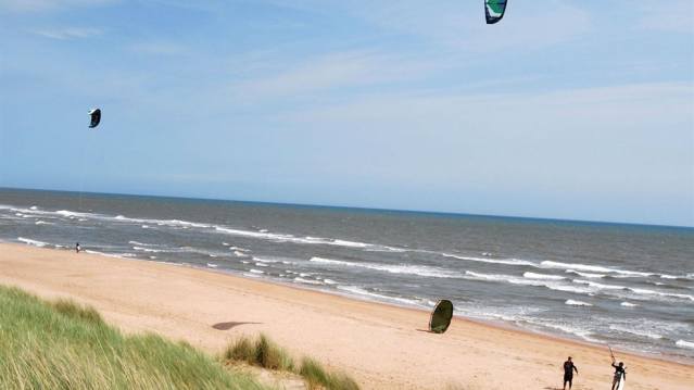 People parachuting at Balmedie Beach in Aberdeen