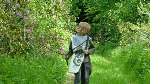 Boy exploring grounds of Traquair House
