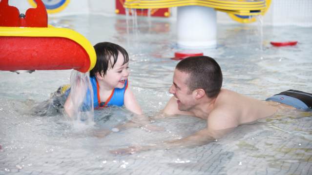 Dad and son in swimming pool at Dunes Splash World in Southport 