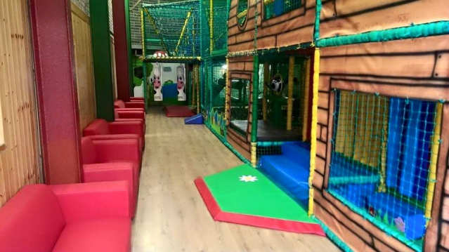 Indoor soft play frame and seating area at Windmill Animal Farm in Burscough