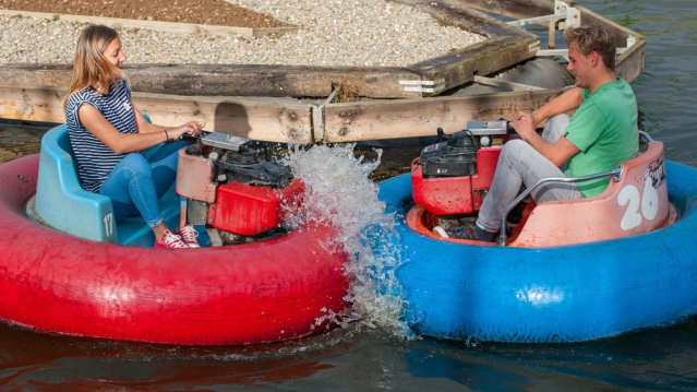 Couple on dodgem boats at Heatherton World of Activities in Tenby
