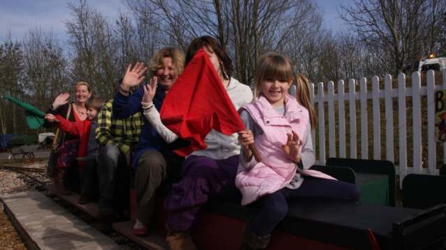Families on miniature train at Bursledon Brickworks Industrial Museum in Swanwick
