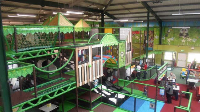 Indoor soft play frame and cafe area at Pandamonium Play Centre in Erskine
