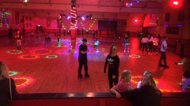 People rollerskating at Wigan Roller Rink