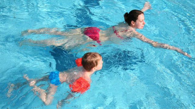 Mum and son swimming at Eccleshill Pool in Bradford