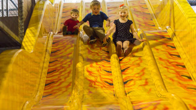 Kids on slide at Farmer Teds Farm Park in Ormskirk