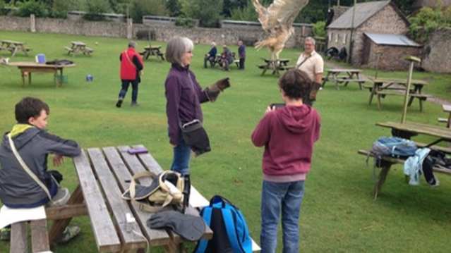 Family with bird at Exmoor Owl and Hawk Centre in Minehead