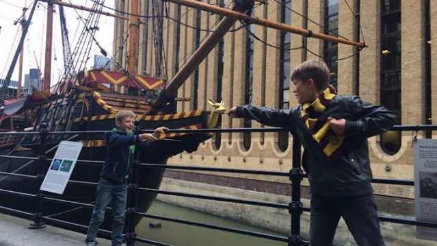 Kids with wands at Tour for Muggles in London 