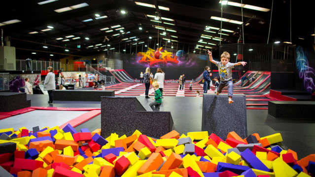 Boy jumping into foam pit at Ryze Edinburgh in Dalkeith