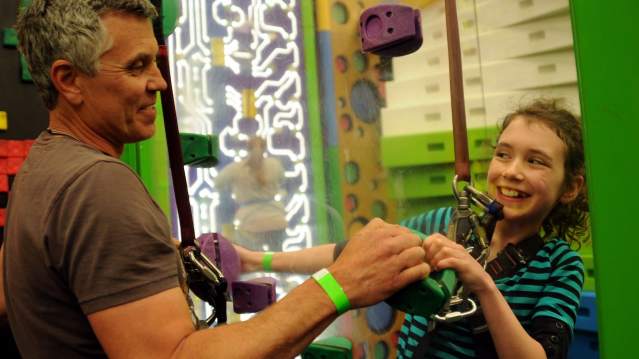 Dad and daughter climbing at Clip 'n Climb Tonbridge