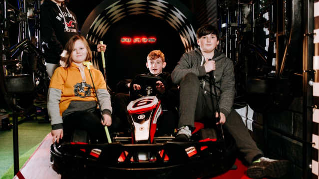 A group of kids at Putt Club Crazy Golf in Hull