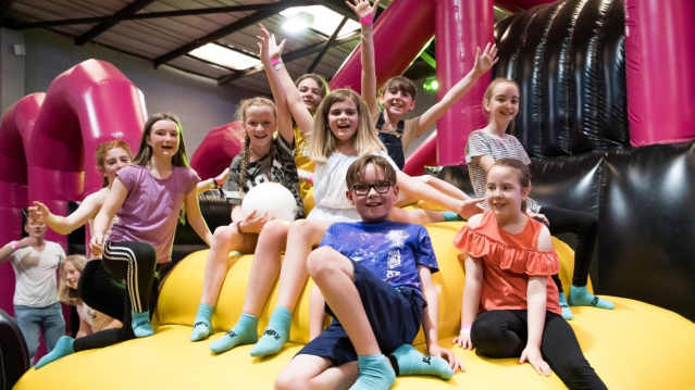 A group of kids at Jump Inc Inflatable and Trampoline park in Lincoln
