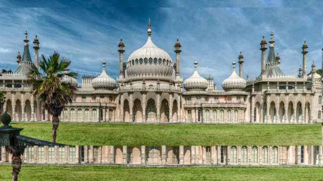 outside of royal pavilion with blue skies and water in the foreground