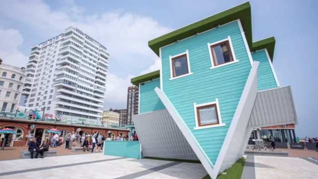 blue upside down house
