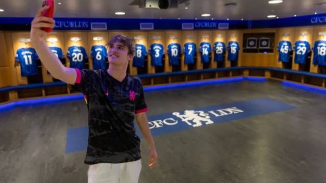  Visitor taking a selfie in the Chelsea FC first team dressing room at Stamford Bridge