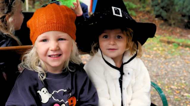 two girls in halloween outfits